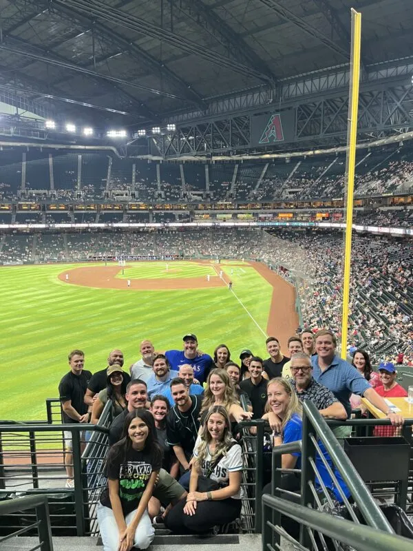 Ally Waste team members on an outing at a baseball stadium